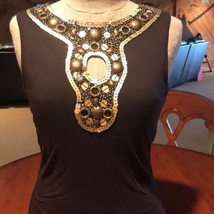 Dark brown sleeveless top with gold/ brass detail